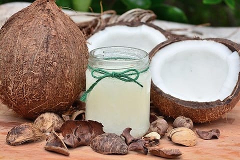 Coconuts with coconut oil image